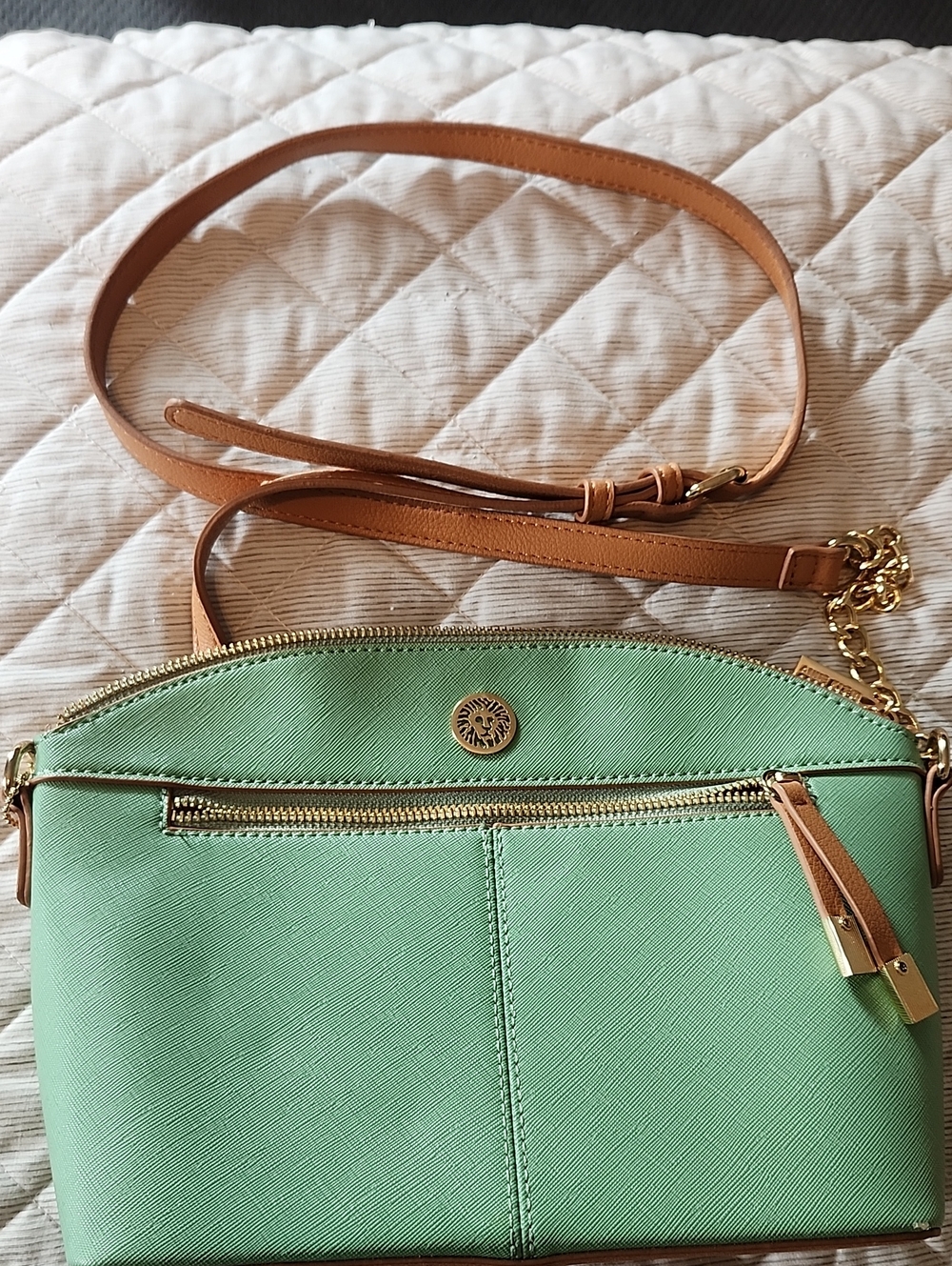 Green Crossbody Bag with Tan Strap and Gold Accents